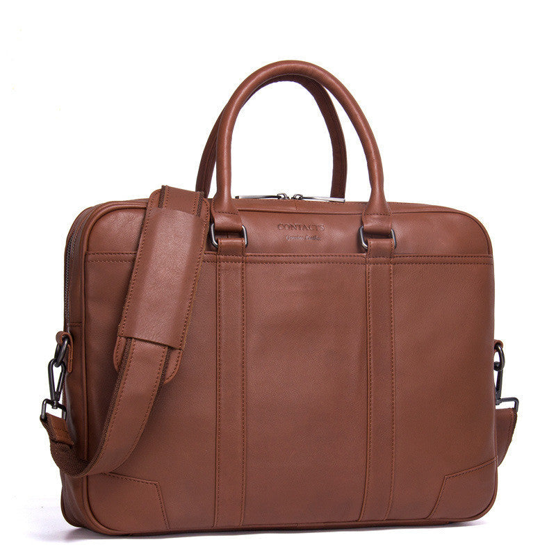 Pi-Mart multifunctional leather men's business briefcase with multiple compartments and sturdy handles, suitable for professional use.
