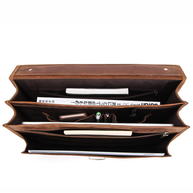 Pi-Mart 14-inch men's leather business briefcase with sturdy handles and multiple compartments for professional use.