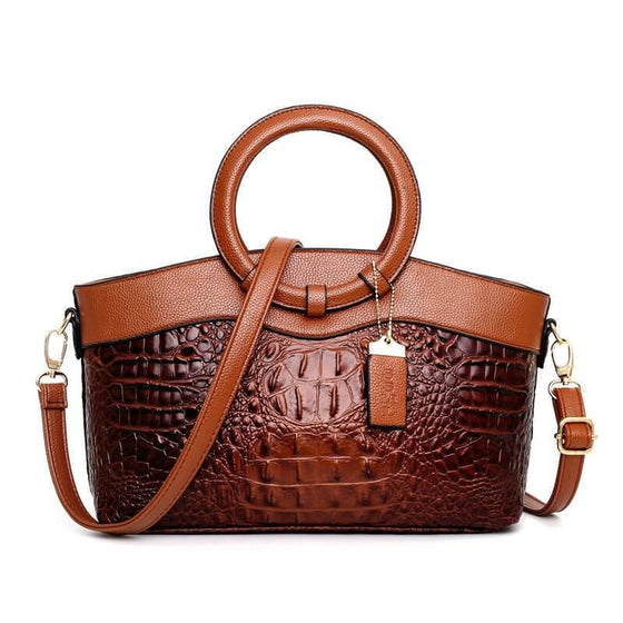 Luxury handbag for moms with crocodile print design and durable polyester material in a horizontal square shape.