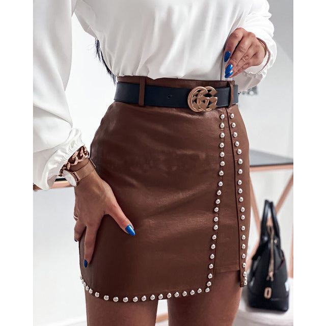 Elegant Fashion Rivets PU Leather Skirts WomenElevate your style with our Elegant Fashion Rivets PU Leather Skirts for women! Available in black and brown, this sleek skirt is perfect for any occasion. Made withSkirtsPlush Fashions ShopPlush Fashion Shop