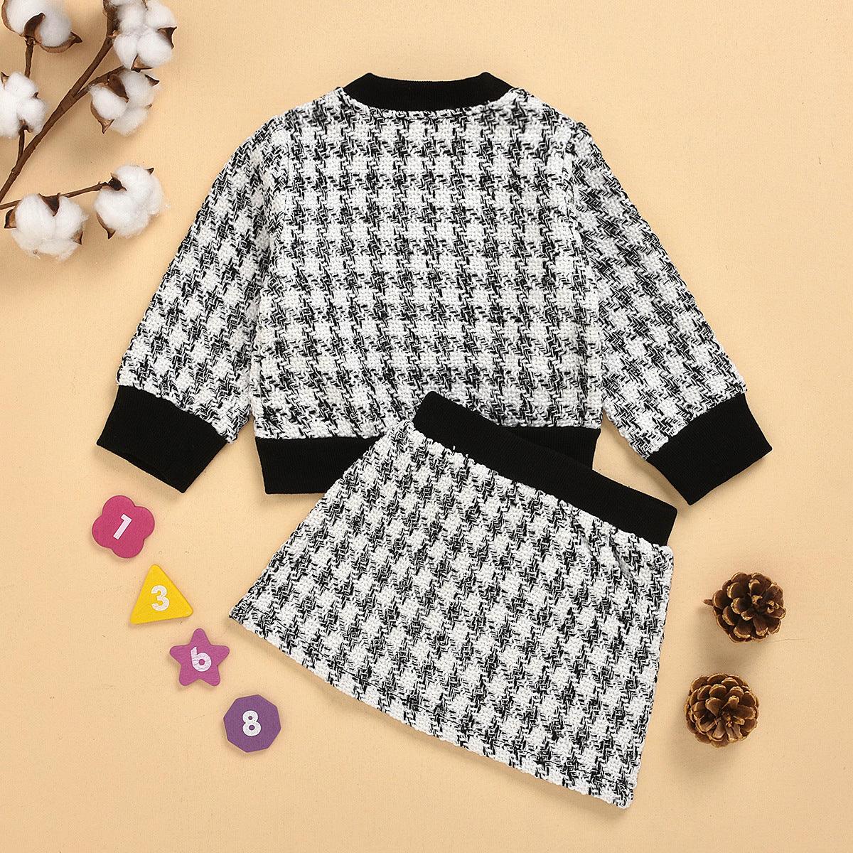 Black long-sleeved temperament two-piece suit skirt plaid children's cExperience sophistication and comfort with our black, long-sleeved two-piece suit skirt for middle and small children. Made with high-quality cotton fabric, this suiBaby clothsPlush Fashions ShopPlush Fashion Shop