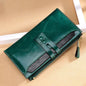 Green oil wax leather wallet with buckle and multi-card slots.