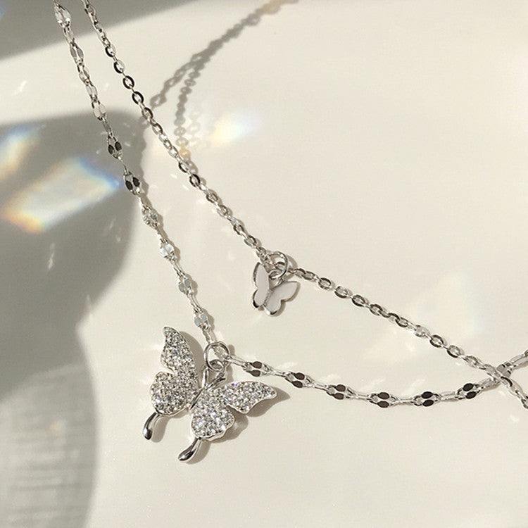 Fashion Jewelry Elegant Silver Color Shiny Butterfly Necklaces Ladies Introducing the stunning "Fashion Jewelry Elegant Silver Color Shiny Butterfly Necklaces" from Plush Fashions Shop Vintage Summer Spice. This exquisite double layer NecklacePlush Fashions ShopPlush Fashion Shop