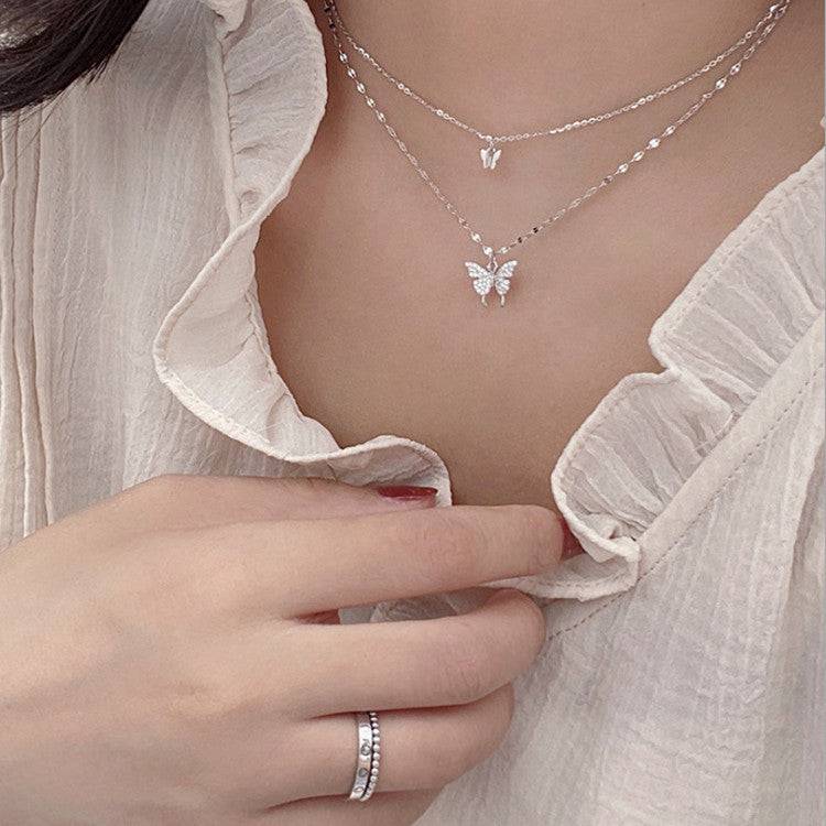 Fashion Jewelry Elegant Silver Color Shiny Butterfly Necklaces Ladies Introducing the stunning "Fashion Jewelry Elegant Silver Color Shiny Butterfly Necklaces" from Plush Fashions Shop Vintage Summer Spice. This exquisite double layer NecklacePlush Fashions ShopPlush Fashion Shop