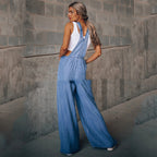 Women’s wide leg denim overalls by FitiqueFit, casualwear with relaxed fit, featuring adjustable straps and front pockets.