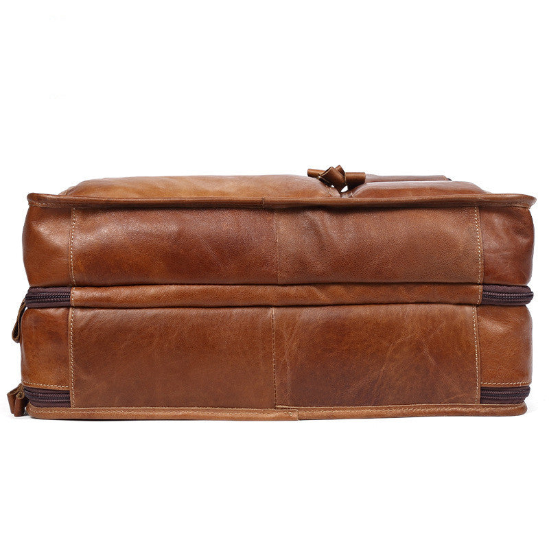 Casual retro leather men's briefcase by Pi-Mart, featuring a classic design with sturdy handles and a spacious interior.