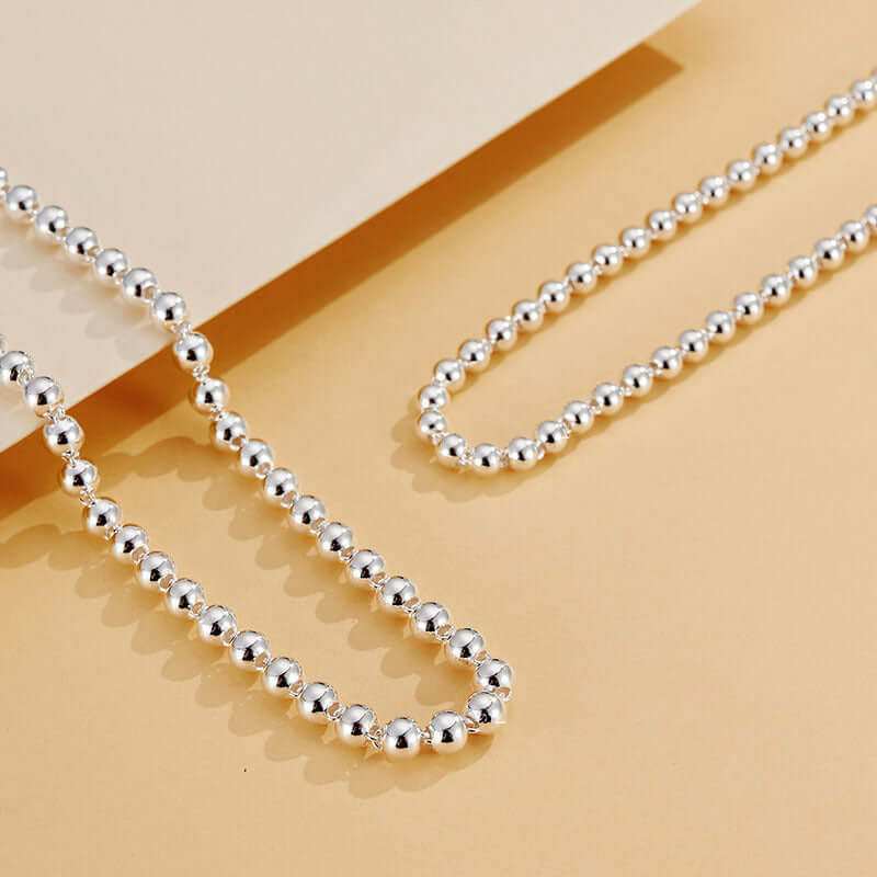 925 Sterling Silver Round Beads Women'S Short Chain Necklace CollarAdd a touch of elegance and charm to any outfit with our 925 Sterling Silver Round Beads Women's Short Chain Necklace Collar. Crafted in Korean style with authentic JeweleryPlush Fashions ShopPlush Fashion Shop