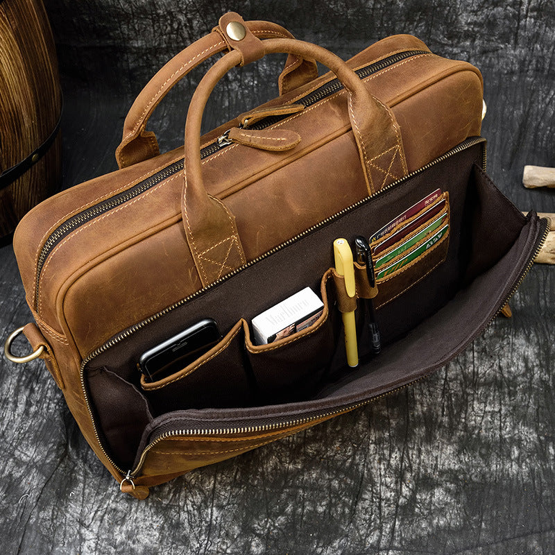 Vintage men's genuine leather briefcase by Pi-Mart, featuring a classic design with a sturdy business commuter style and rugged Crazy Horse leather.