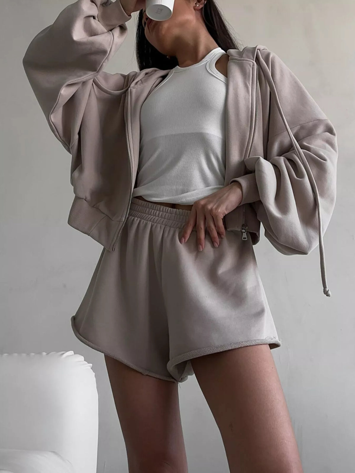 Plush Fashion Hub zip-up long sleeve outerwear and shorts set with matching shorts, casual style, silhouette visible.