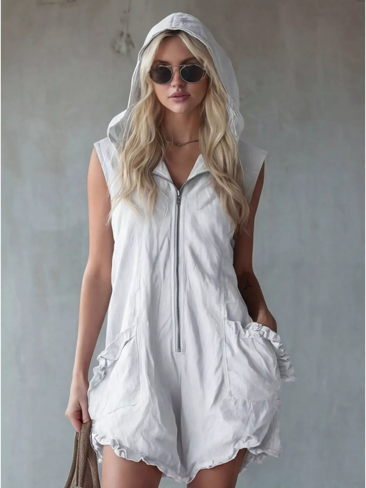 Plus size hooded sleeveless zipper romper with ruffled pockets by Plush Fashion Hub, featuring a full-length design and casual style.