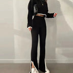 Women’s casual color-block two-piece set by FitiqueFit featuring a stylish top and matching pants in vibrant colors.
