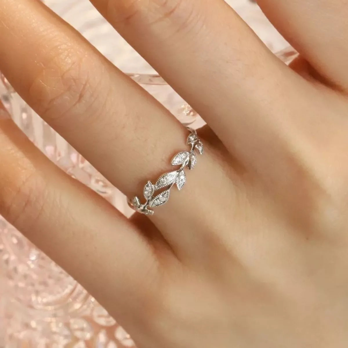 925 sterling silver leaf ring with intricate leaf design, showcasing detailed craftsmanship and elegant style.