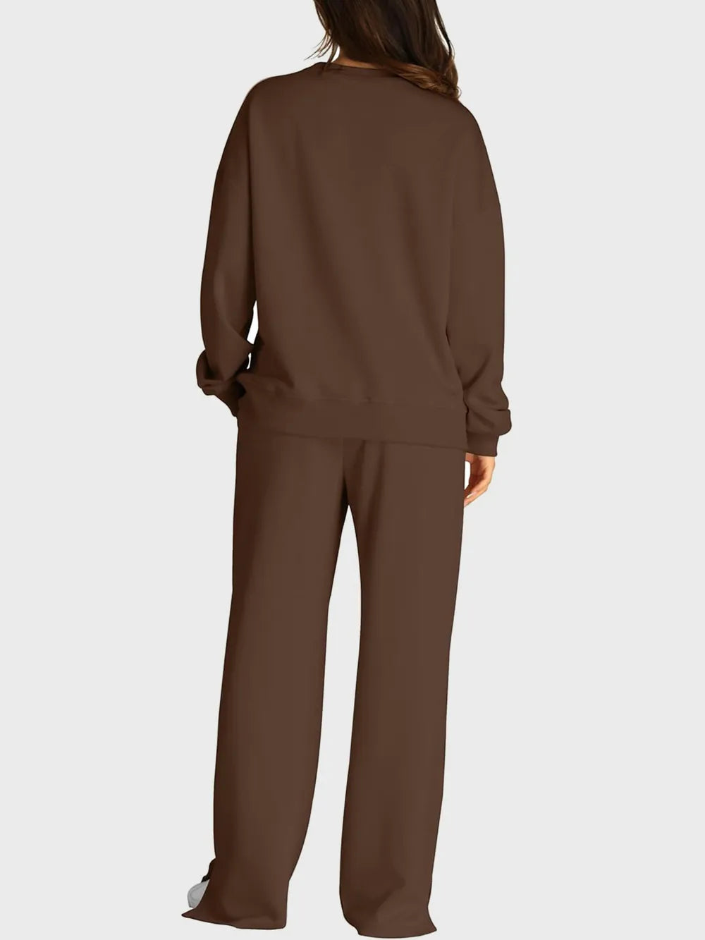 Trendsi round neck long sleeve top and slit pants set, stylish matching outfit for casual or trendy wear, shown on a model.