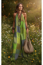 Women's plaid print jumpsuit from Plush Fashion Hub featuring sleeveless, wide-leg design and suspender style.