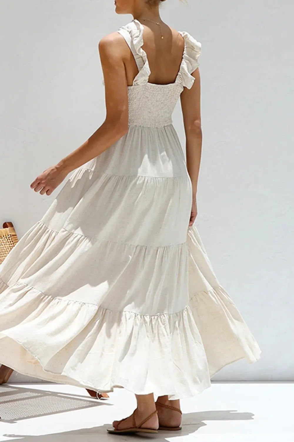 Women's cotton ruffled V-neck tiered midi dress in soft, breathable fabric with feminine ruffle details and a flattering V-neck.
