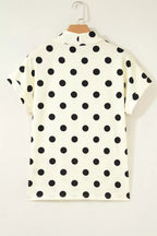 Polka dot print high neck dolman top from Trendsi, featuring a relaxed fit and stylish design, shown in the product image.