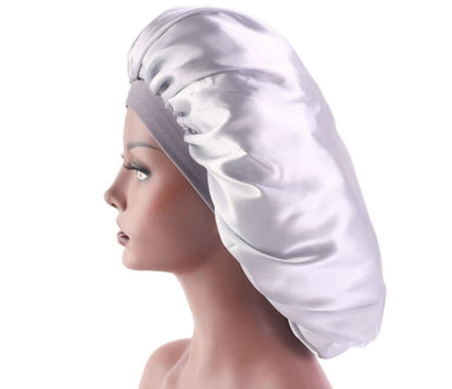 Beauty print Satin silk Bonnet sleep night capTransform your sleep routine with our Beauty print Satin silk Bonnet! Made with a luxurious blend of polyester and spandex, this bonnet is perfect for all seasons. SBonnetPlush Fashion ShopPlush Fashion ShopBeauty print Satin silk Bonnet sleep night cap