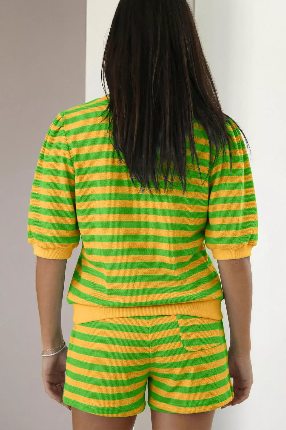 Striped puff sleeve top and drawstring shorts matching set by Plush Fashion Hub, featuring stylish striped fabric and comfortable fit.
