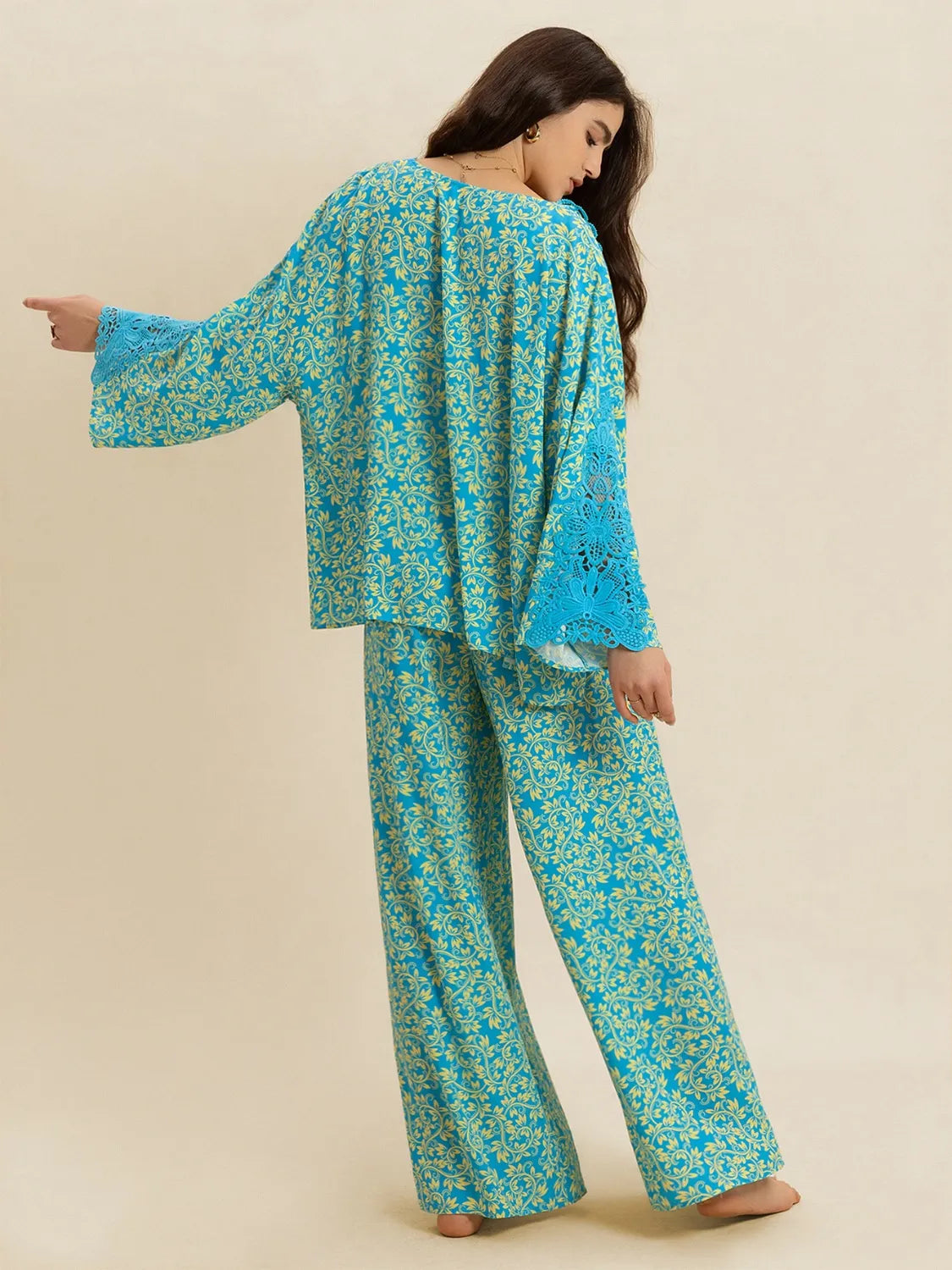 Open front printed matching top and pants set by Plush Fashion Hub, casual loungewear with stylish floral pattern.