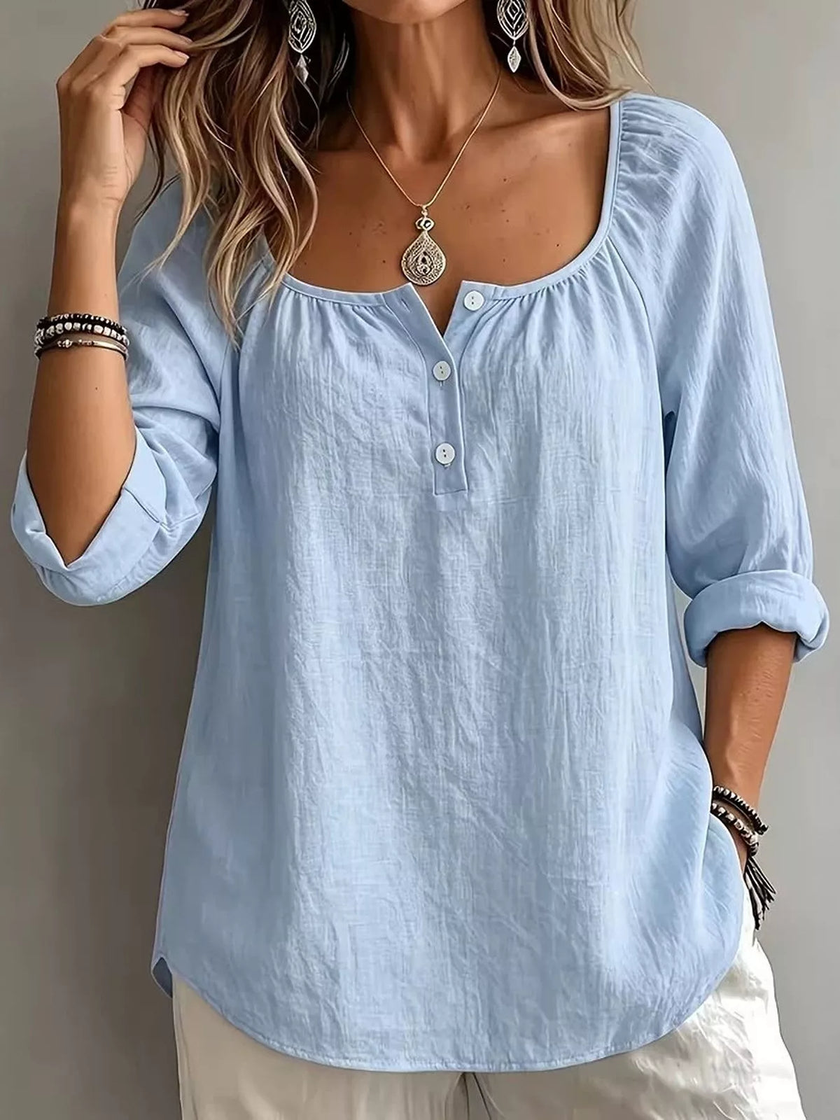 Plush Fashion Hub long sleeve top featuring button details and a soft plush fabric, stylish and comfortable for casual wear.