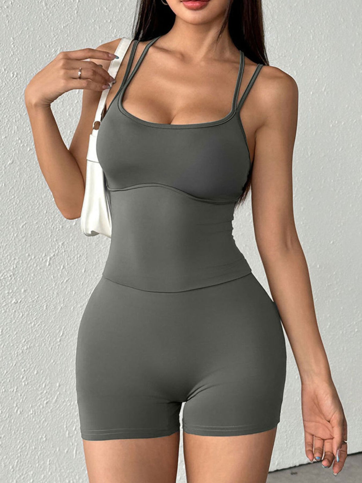 Plush Fashion Hub double spaghetti strap active romper in lightweight fabric, featuring a fitted design and adjustable straps.