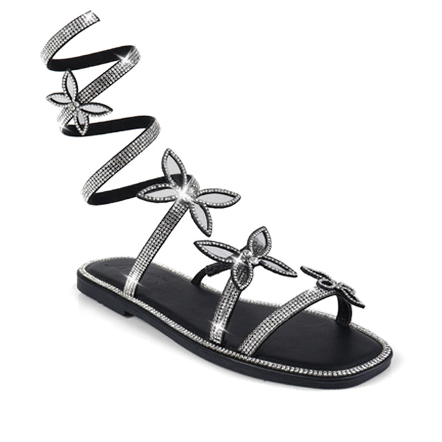 Plush Fashion Hub Nancy-1 sandals featuring open-toe design, stylish straps, and comfortable footbed in neutral tones.