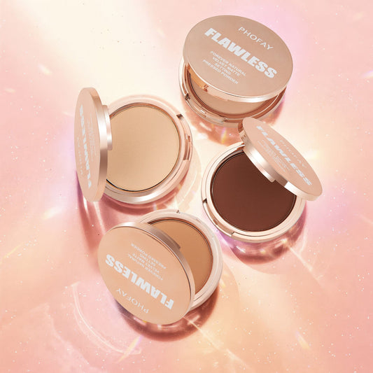 PHOFAY Matte Setting Pressed Powder in open compacts on a shimmering surface.