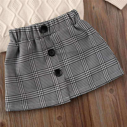 Turtleneck sweater + plaid skirt suitThis elegant suit features a turtleneck sweater and plaid skirt, perfect for any occasion. Long sleeves provide warmth, while the cotton fabric guarantees comfort. WGirls 2 piece setPlush Fashions ShopPlush Fashion Shop