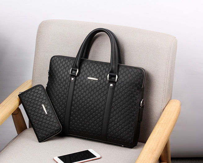 Men's Pi-Mart business briefcase with sturdy leather exterior and multiple compartments for professional use.