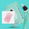 Children's nasal aspirator with soft silicone tips and sterilization kit against a mint green background.