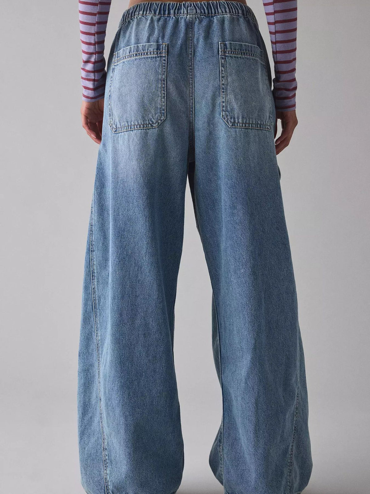 Women’s relaxed fit utility denim cargo jeans with drawstring waist from Plush Fashion Hub, featuring multiple pockets and casual style.