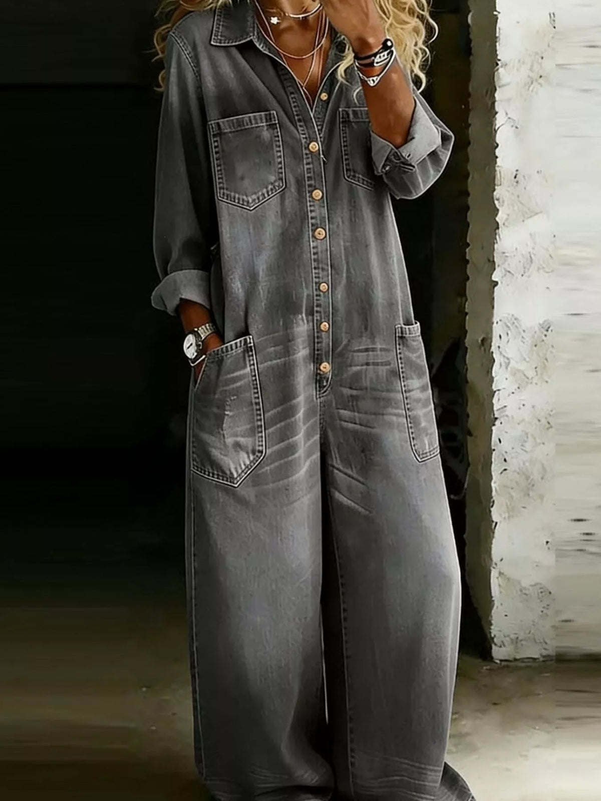 Plus size full button front wide leg jumpsuit with chest pockets, trendy and comfortable, shown in a stylish fashion image.