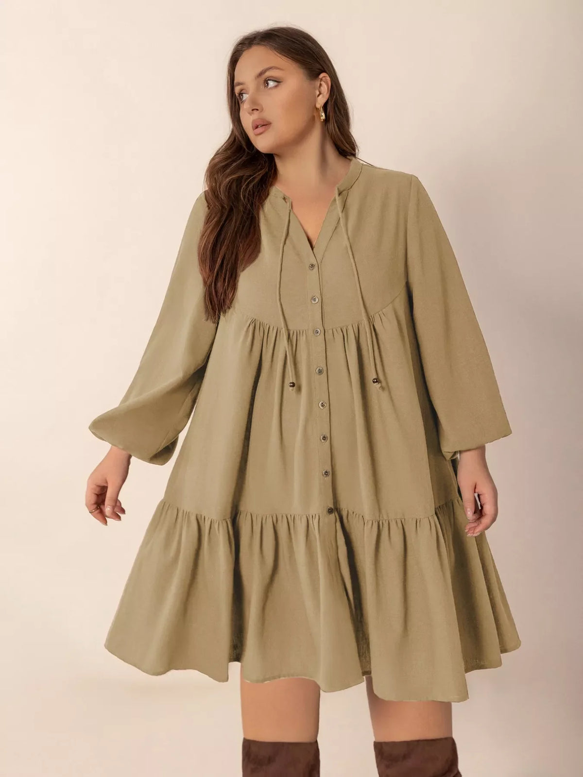Plus size tie neck balloon sleeve dress by Plush Fashion Hub featuring a stylish design and comfortable fit.