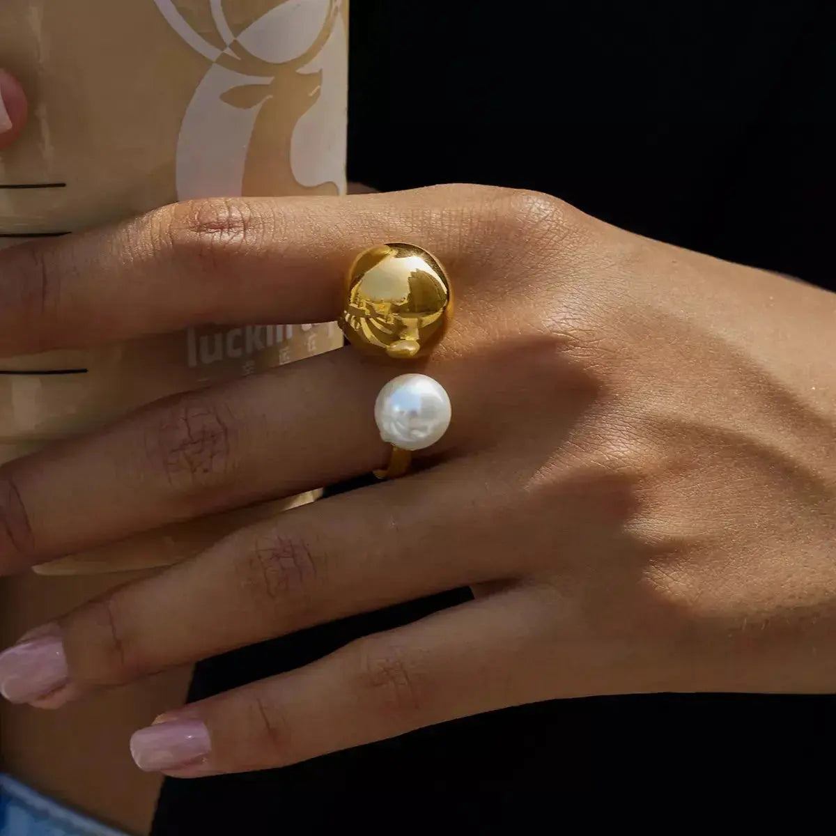 18K gold-plated celestial pearl and orb open ring with adjustable design, showcasing elegant jewelry style.