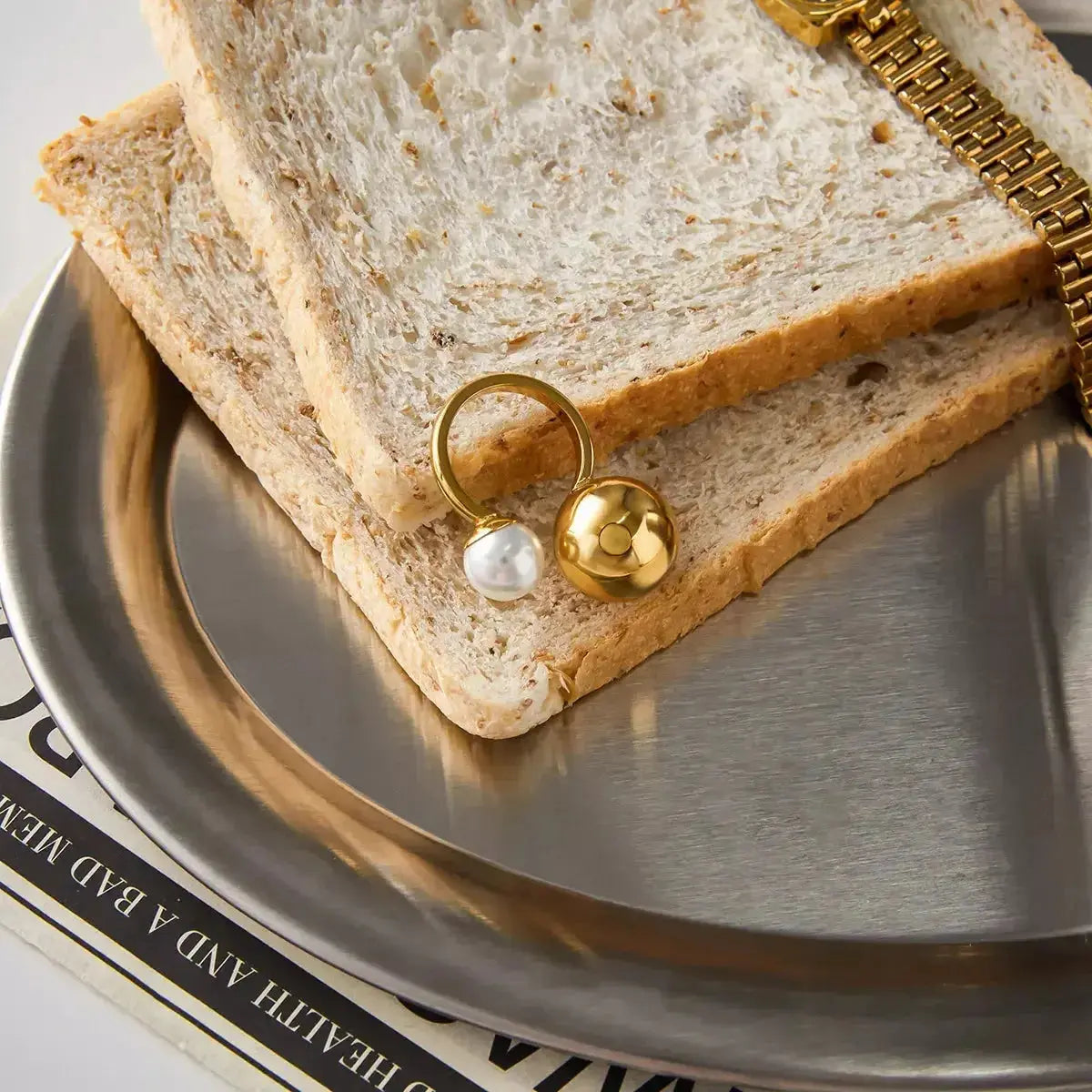 18K gold-plated celestial pearl and orb open ring with adjustable band, featuring a stylish and elegant design.