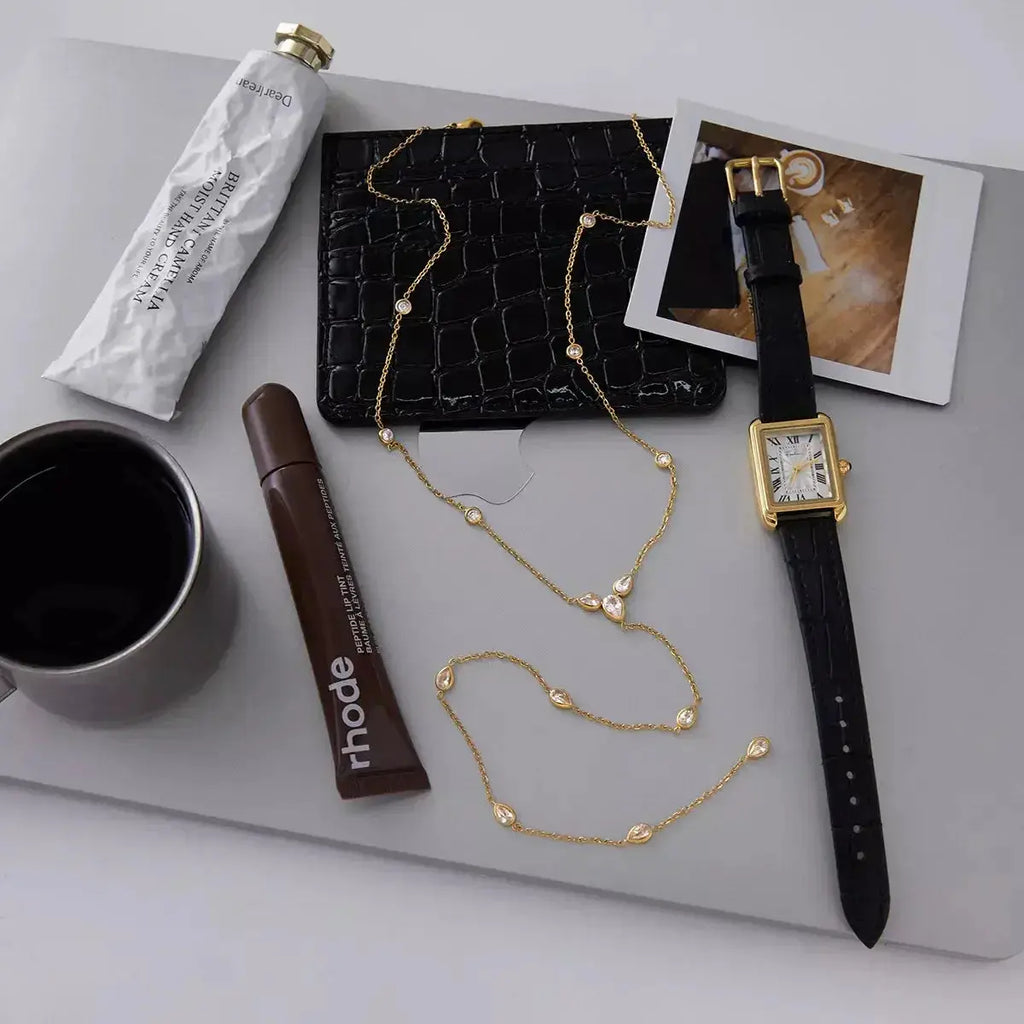 Dainty 18K gold-plated zircon chain necklace with sparkling stones, perfect for elegant statement jewelry.