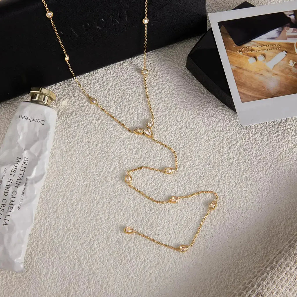18K gold-plated zircon chain necklace by Plush Fashion Hub, featuring a delicate dainty design with sparkling zircon stones.