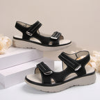 Women's adjustable Velcro open toe flat sandals by Trendsi, featuring comfortable walking shoe design and easy-to-use straps.