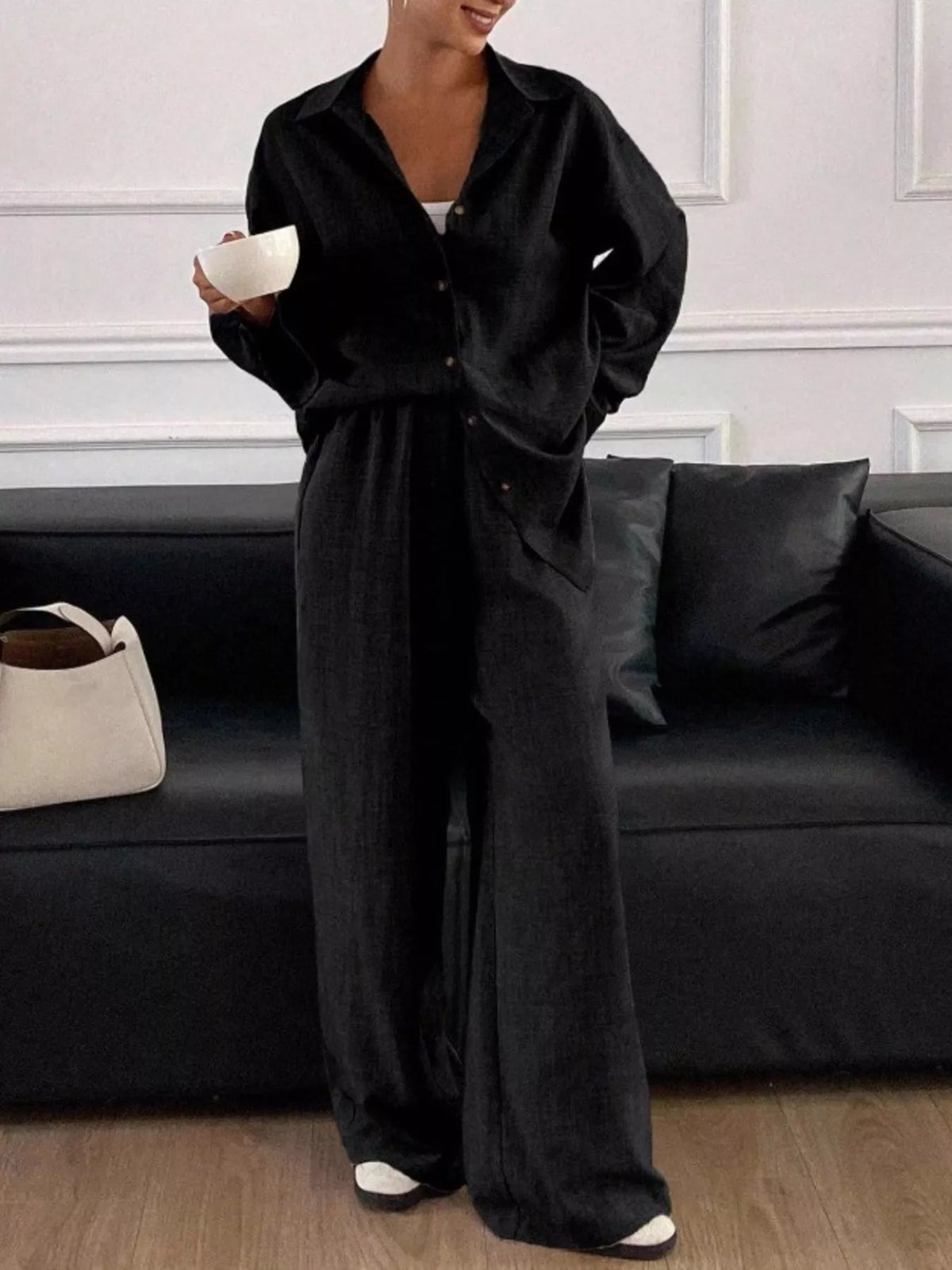 Trendsi long sleeve button-up shirt and wide-leg pants set, stylish and comfortable clothing ensemble for casual or office wear.