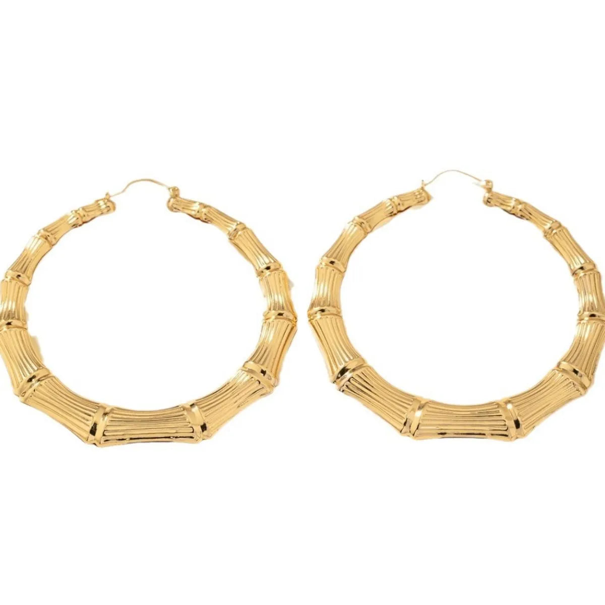 Stainless steel textured hoop earrings with a polished finish, stylish jewelry accessory for women.