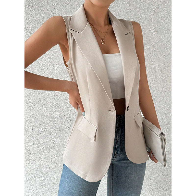 Women's sleeveless open-front blazer vest by FitiqueFit, stylish work and office jacket, shown in a professional setting.