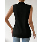 Women's sleeveless open-front blazer vest by FitiqueFit, perfect for work and office attire, shown in a stylish professional setting.