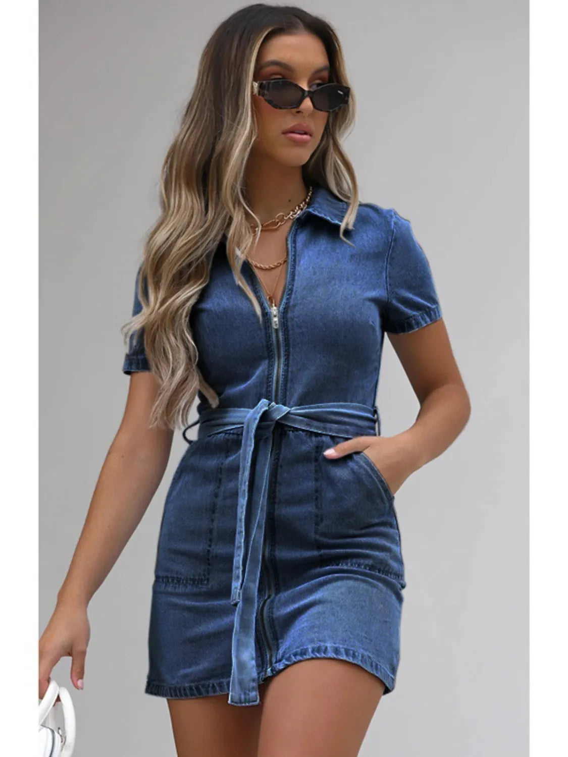 Plus size denim dress by Plush Fashion Hub with short sleeves and full zip front, displayed on a hanger.
