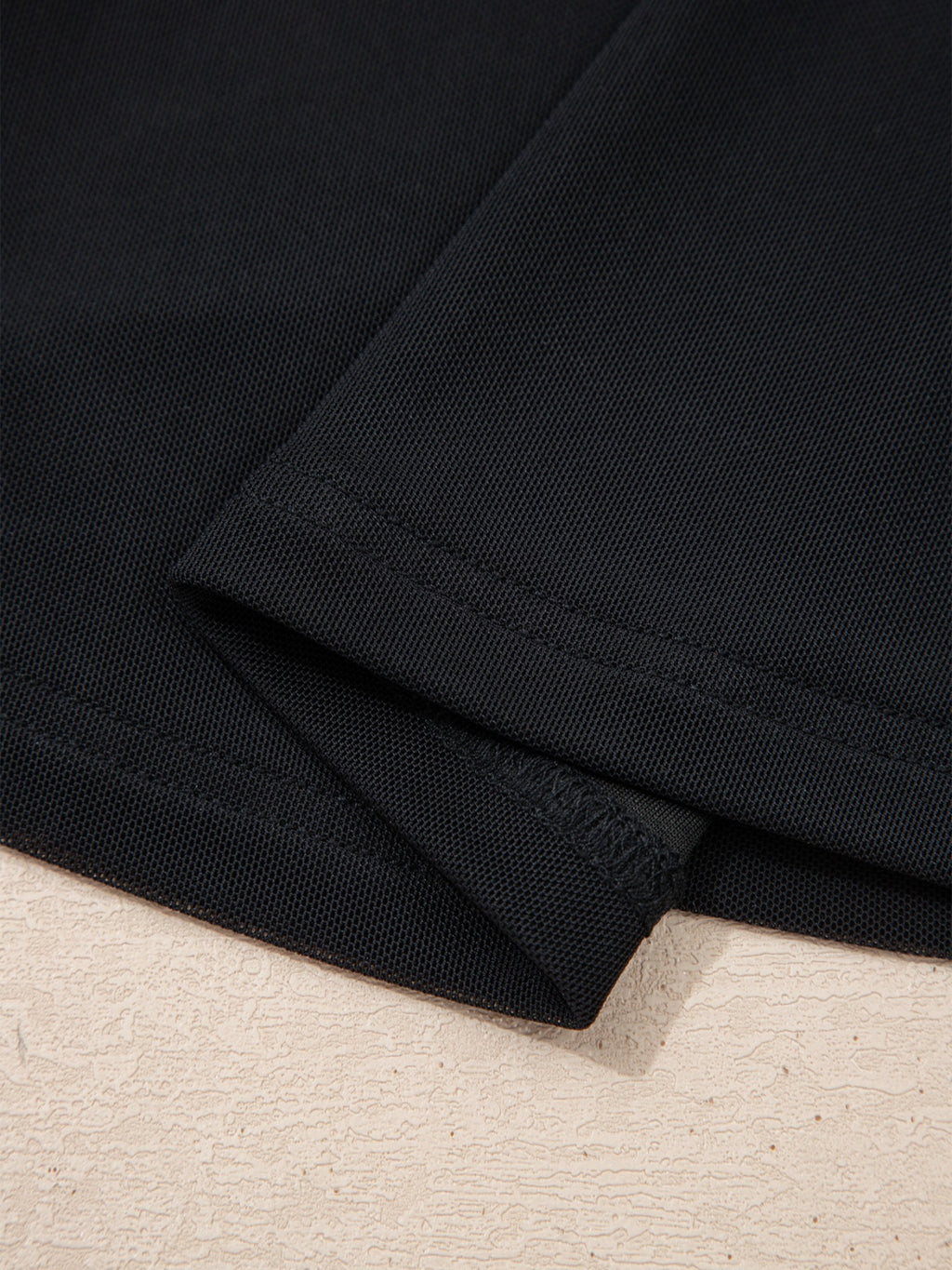 Women's sheer mesh patchwork cap sleeve T-shirt by Trendsi, featuring elegant layered design and stylish ring accents.