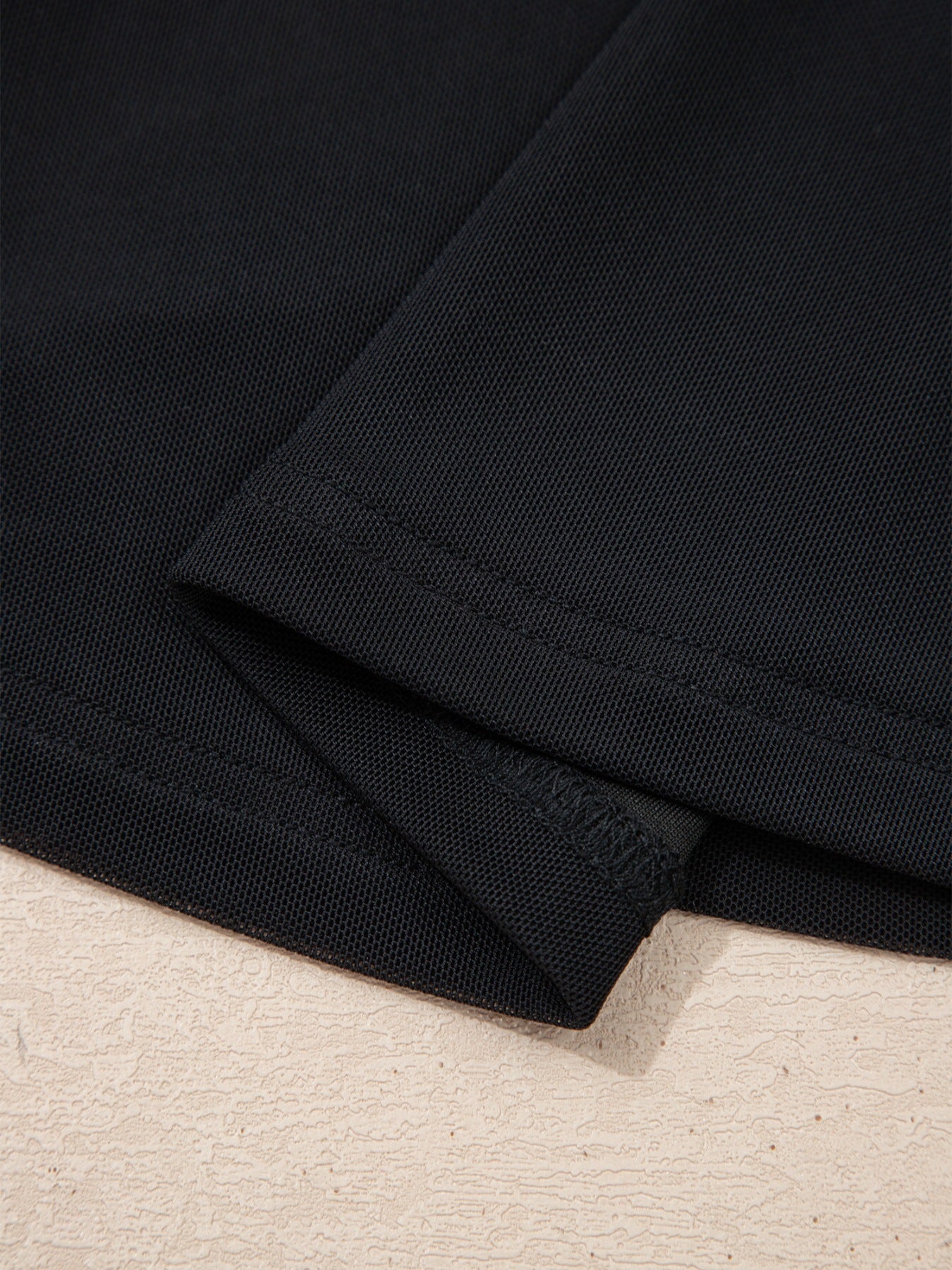 Women's sheer mesh patchwork cap sleeve T-shirt by Trendsi, featuring elegant layered design and stylish ring accents.