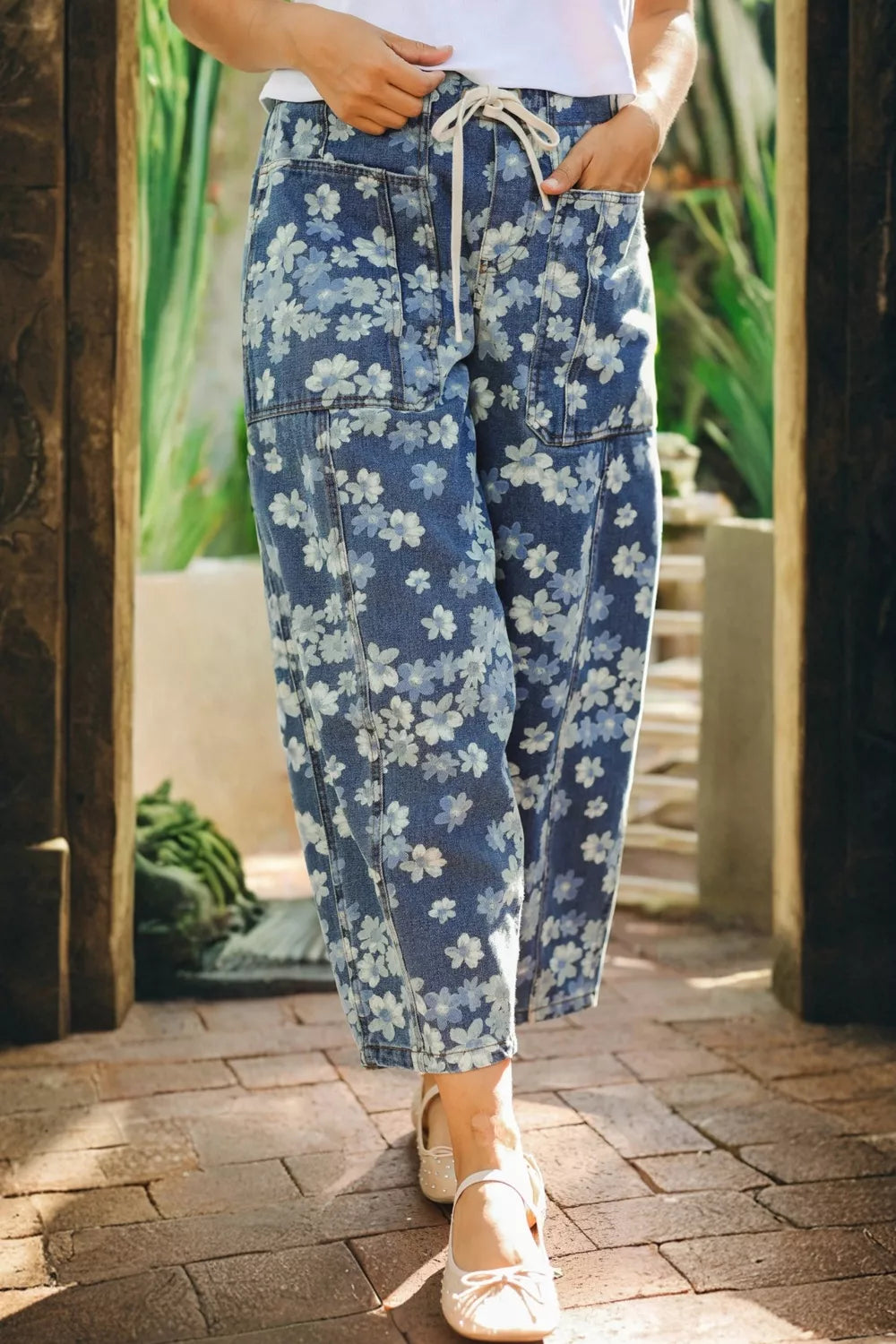 Dainty floral printed drawstring barrel jeans by Plush Fashion Hub with colorful floral patterns and relaxed fit.
