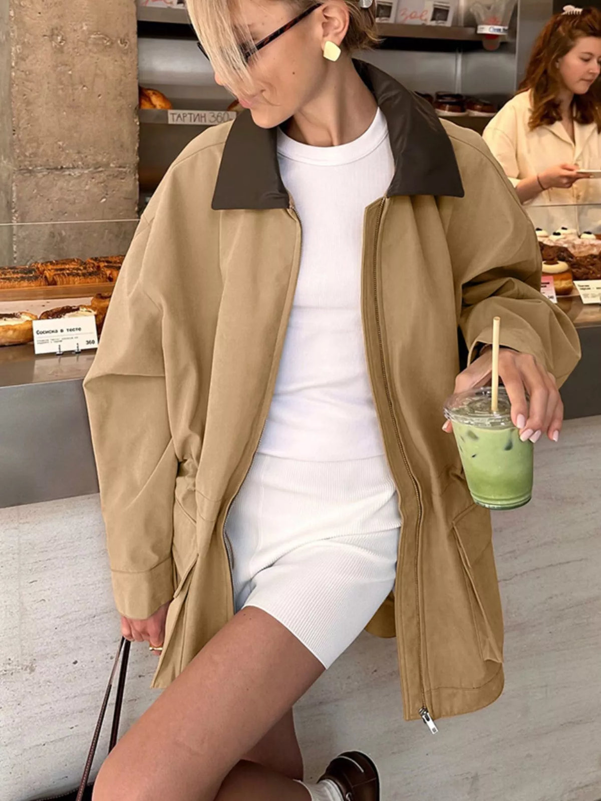 Oversized jacket with contrast collar and drawstring waist, trendy outerwear by Trendsi, shown in a stylish, casual fit.