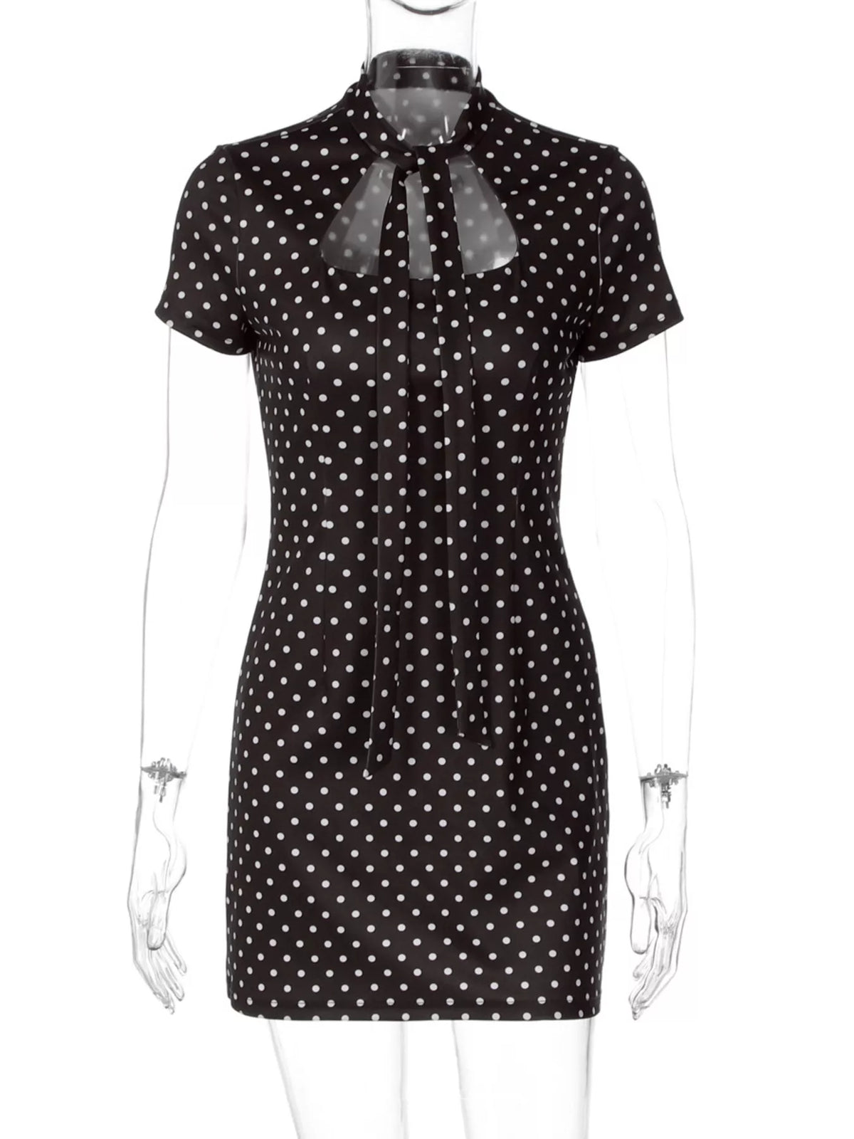 Polka dot cut-out front mini dress by Plush Fashion Hub featuring a stylish design with playful polka dots and a trendy cut-out detail.