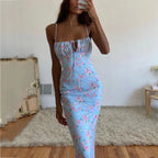 Elegant floral pleated maxi dress for women, stylish evening dress with a flattering fit and intricate floral pattern.