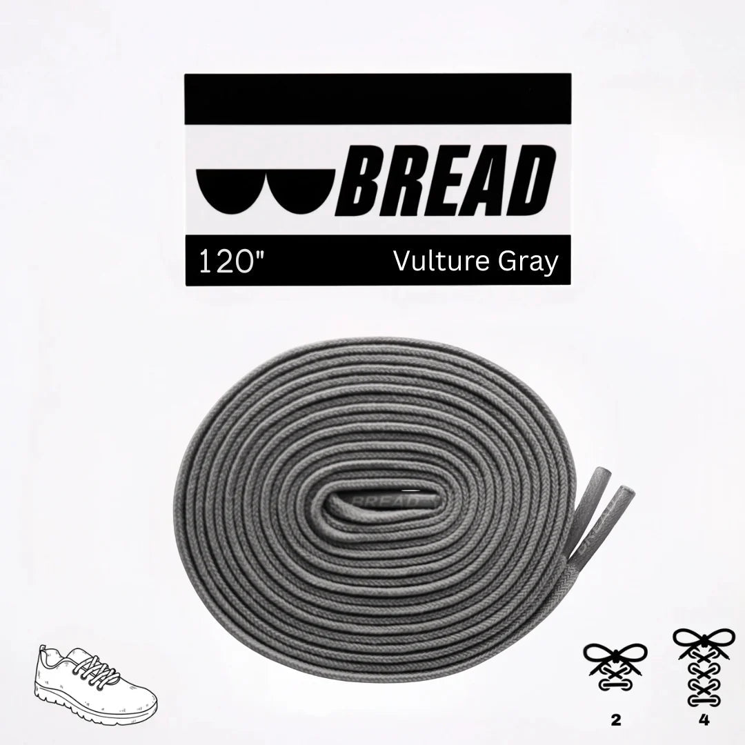 Gray elastic shoelace from Bread's Vulture collection, showcasing a flexible, durable design for comfortable footwear.